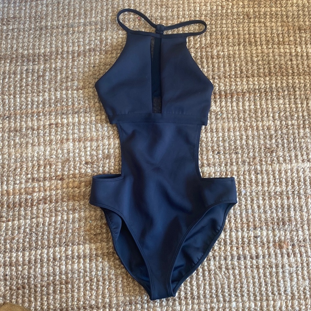 Athletic & sexy Swimsuit - worn once. Great for surfing or skiing water sports